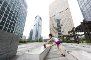 Female exercising in an urban environment