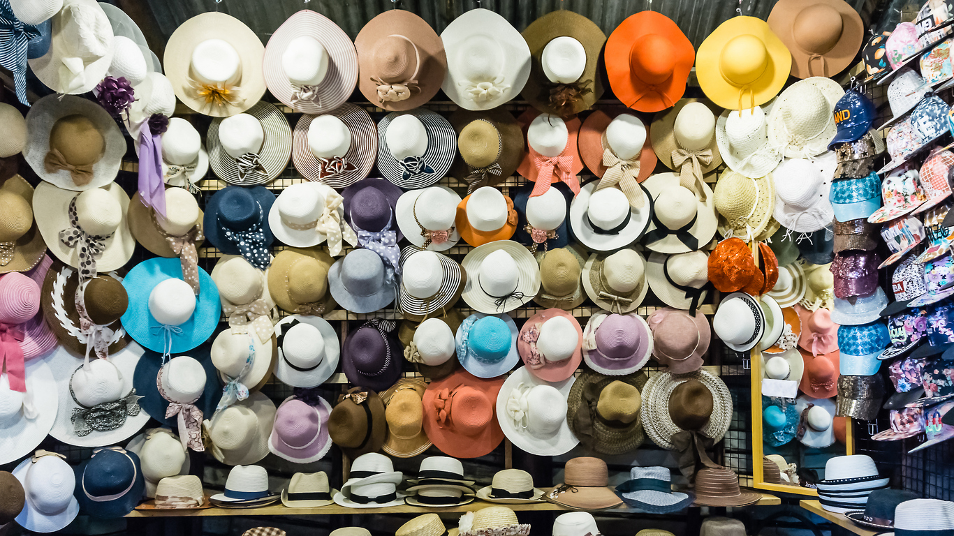 Lovely colorful caps, hats,on wall in shop - Savvy Tokyo