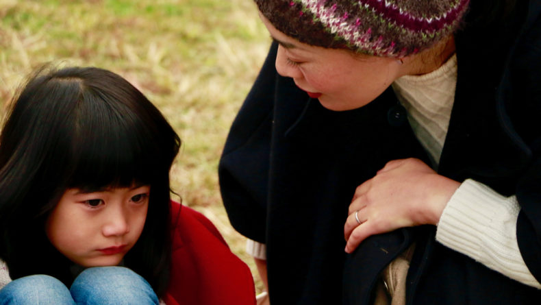 Mother with grumpy daughter - Savvy Tokyo