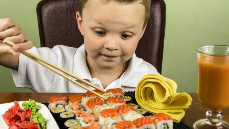 boy eats sushi set - Savvy Tokyo