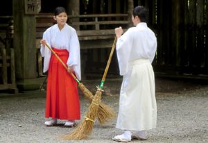 Shrine keepers sweeping - Decluttering