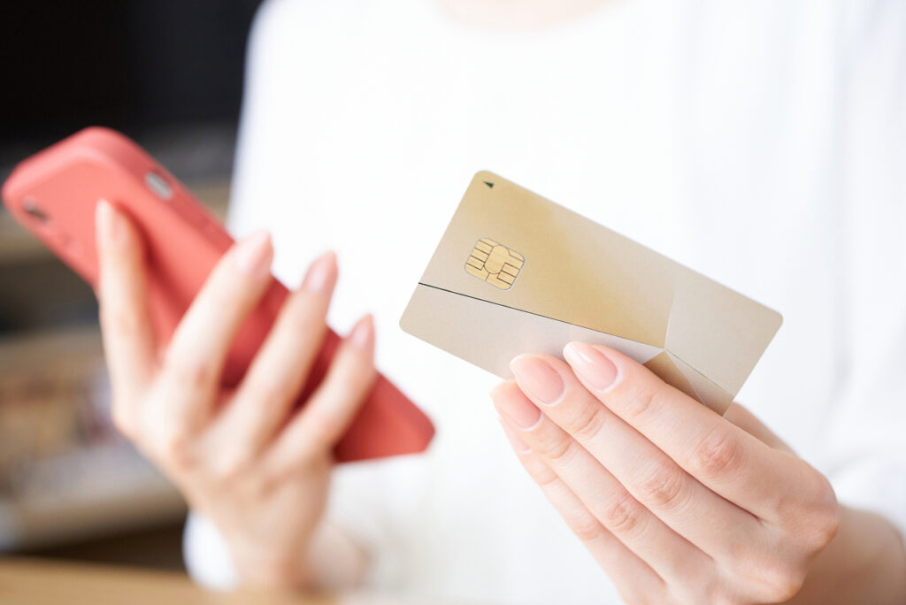  Woman's hand with credit card